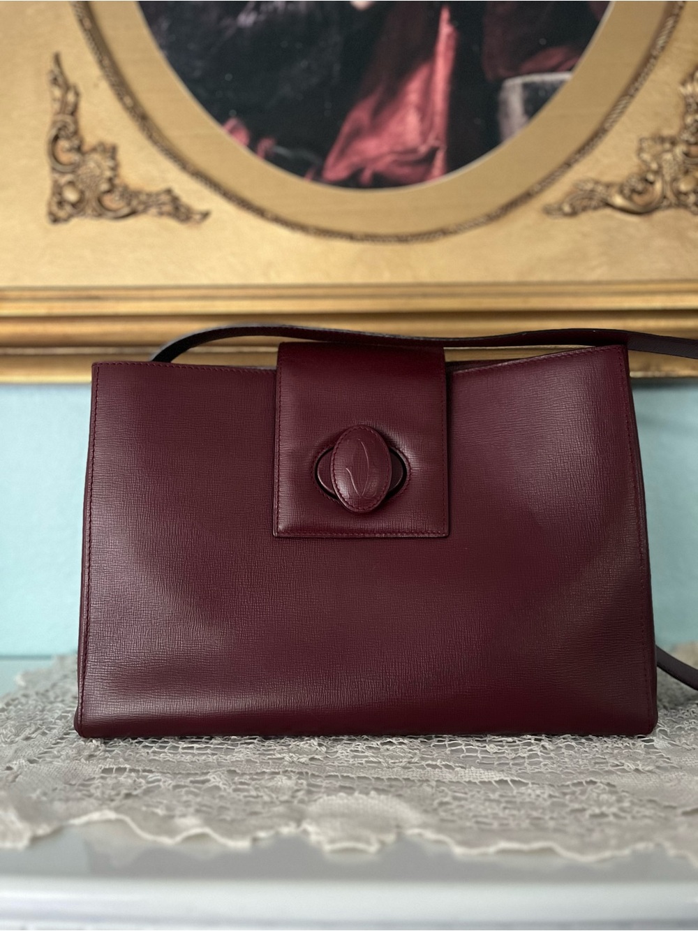 Cartier “Must de Cartier” Bordeaux Leather Shoulder bag in pristine condition.